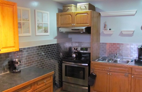 Southeast Calgary House | Lake Sundance - Private Walk Out Suite