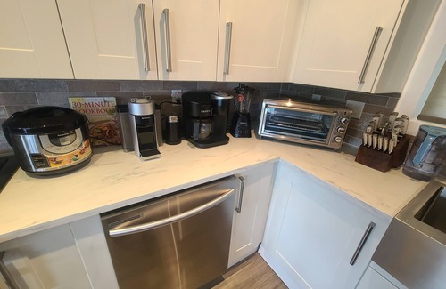 Vernon House | Lake views beautiful 4 bedroom , 2 living rooms home with hot tub.