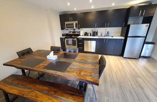 Vernon House | Lake views beautiful 4 bedroom , 2 living rooms home with hot tub.