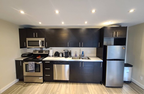 Vernon House | Lake views beautiful 4 bedroom , 2 living rooms home with hot tub.