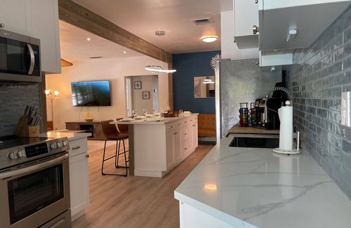 Parrot Cove House | Lake Worth Beach house - 4 bed 3 bath- with private heated pool in Parrot Cove.