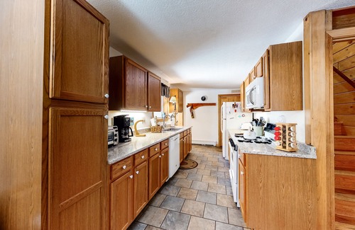 Beaver Cove House | Lakefront cabin close to town with dock, firepit - dogs welcome
