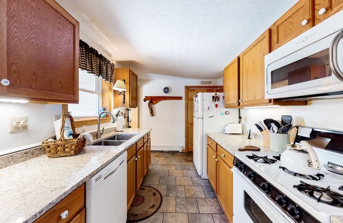Beaver Cove House | Lakefront cabin close to town with dock, firepit - dogs welcome