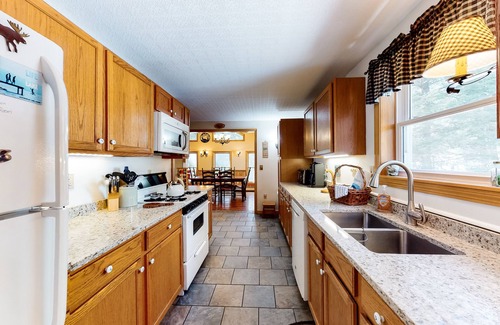 Beaver Cove House | Lakefront cabin close to town with dock, firepit - dogs welcome
