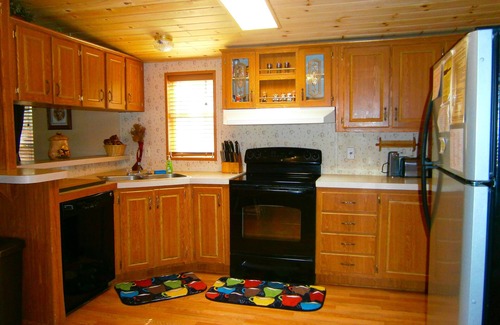 Pinetop-Lakeside Cabin | LAKEFRONT CABIN ON RAINBOW LAKE with 5 Boats, 3 Kayaks, a Canoe and a 36 ft Pier