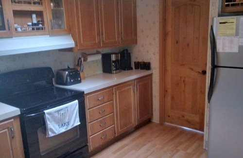 Pinetop-Lakeside Cabin | LAKEFRONT CABIN ON RAINBOW LAKE with 5 Boats, 3 Kayaks, a Canoe and a 36 ft Pier