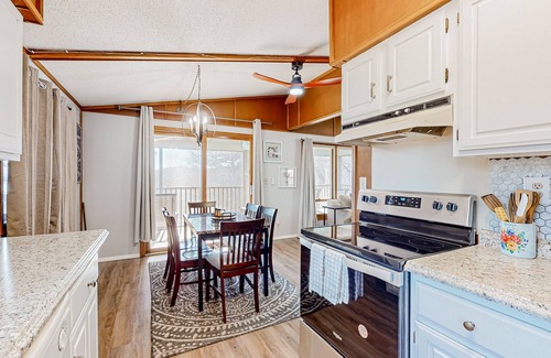 Lost Bridge Village House | Lakefront charmer with game room, decks, & excellent fishing - near rec center