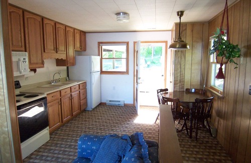 Angola Cottage | Lakefront cottage on first basin of Lake James. Dock, sandy bottom, great sunset
