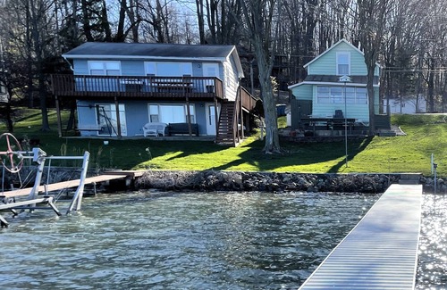 Angola Cottage | Lakefront cottage on first basin of Lake James. Dock, sandy bottom, great sunset