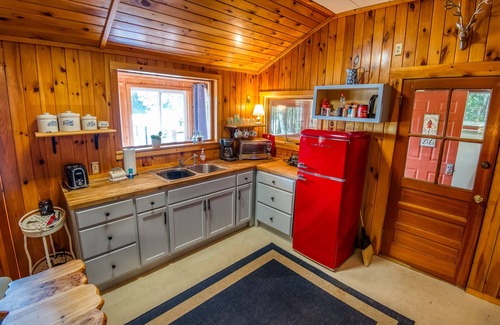 Newfield Cottage | Lakefront Cottage with Private Dock and Kayaks. Dog-Friendly