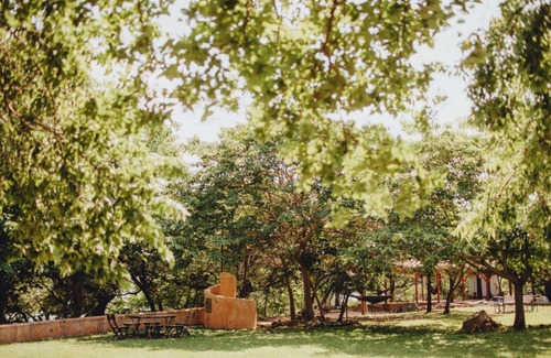 Mouth Of Pedernales Bed & Breakfast | Lakefront Glamping Tent on a Magical Retreat Property