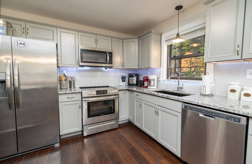 Wise Cabin | Lakefront Home w/Guest House, Tiki bar, Dock, Pet friendly, Kayaks,Peddle boats