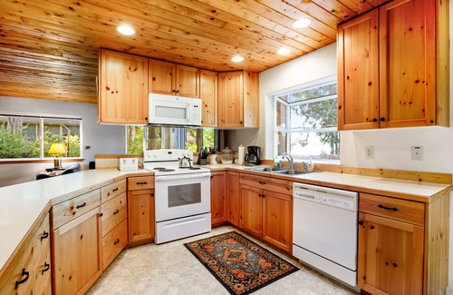 Grapeview House | Lakefront home with beach access, a firepit, washer/dryer & fireplace