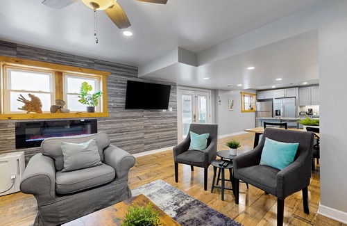 Channel Lake House | Lakefront home with firepit, 2 kitchens, & 2 W/Ds