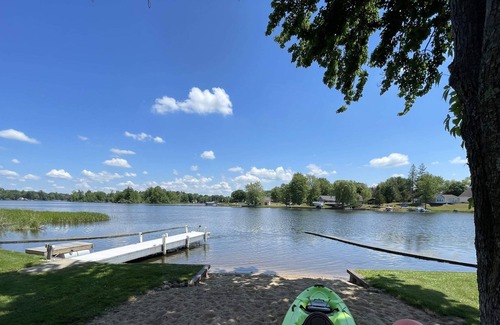 Gladwin House | Lakefront Home With Large Private Yard, Sandy Beach, Kayak and Rowboat Included.