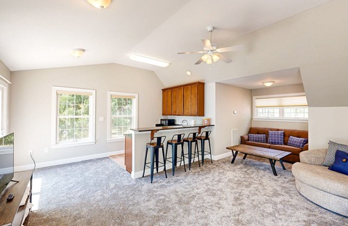 Mineral House | Lakefront home with private dock, kayaks, beach, badminton, firepit, & deck