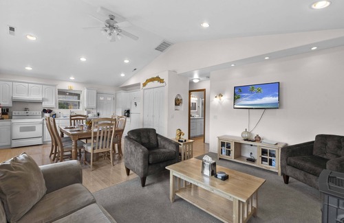 Manson House | Lakefront Home with Private dock, hot tub, SUP and Canoe