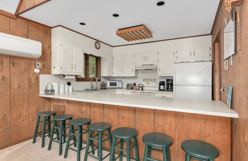 Gouldsboro House | Lakefront Poconos, Private beach, kayaks, rowboat, paddleboards and paddleboat