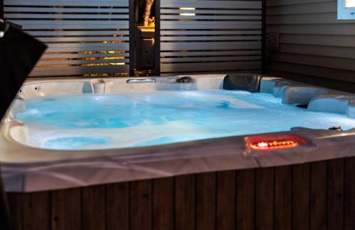 Charlevoix House | Lakefront Retreat, Mins to Dtown, Firepit, Hot Tub, Pet friendly!