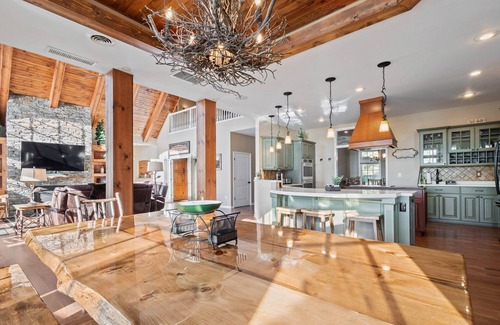 Phelps House | Lakefront retreat with hot tub, water view, game room, home theater & dock
