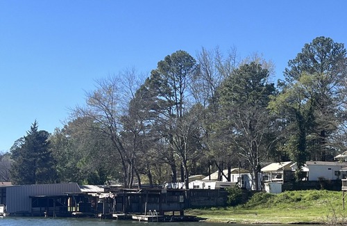 Lakeland RV Rental | lakefront spot for tent/small rv w/access to shared bathroom pet friendly