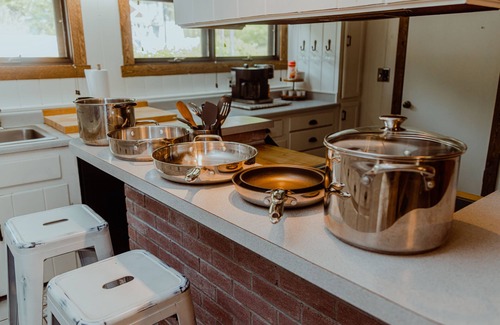 Westminster House | Lakefront; view of ski mountain, firepit, dock, kayaks, laundry, outdoor shower