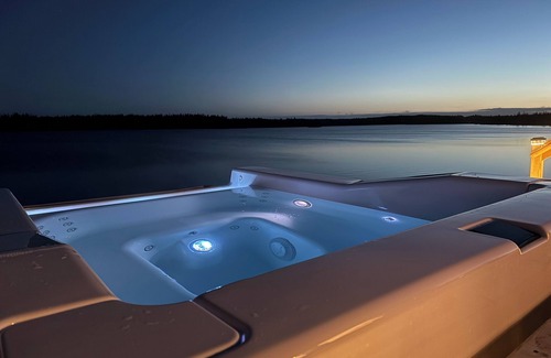 Saint Esprit Cottage | Lakeside Country Home with Handmade Wood Furniture, Hot Tub, Kayaks, 85”TV