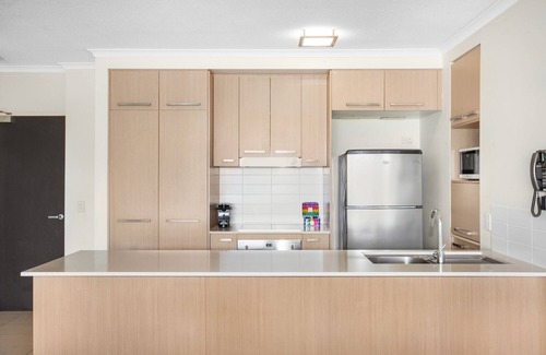 Merrimac Apartment | Lakeside Family Oasis with Pool, Gym and Balcony