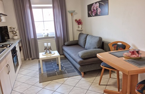 Norddeich Apartment | " Lantern on the 1st floor " cozy and bright, family-friendly apartment