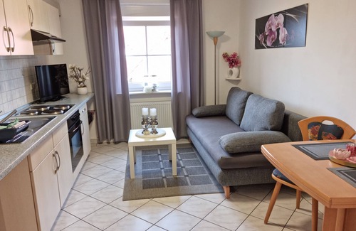 Norddeich Apartment | " Lantern on the 1st floor " cozy and bright, family-friendly apartment