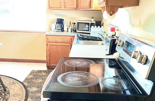 Columbus House | Large and neatly arranged house with a large parking lot .