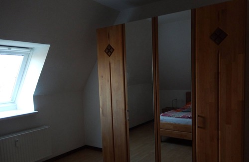 Stinteck Apartment | Large apartment in nearby dike for 4 people with swimming pool in the house.