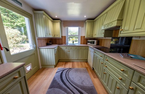 Newton Stewart House | Large country house with garden, sauna, hot tub & games room by Get Better Getaw