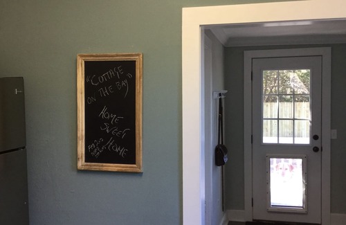 Bay St Louis Cottage | “LARGE DOG” friendly, charming historic cottage with pool, and rock garden.