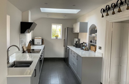 Bacton House | Large family house with private indoor heated pool in walking distance to beach.