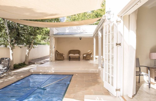 Franschhoek House | Large guest room ensuite, 40 square meters, Flat TV, Fridge , roof fan.