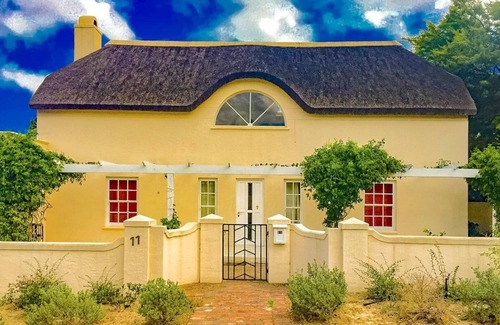Franschhoek House | Large guest room ensuite, 40 square meters, Flat TV, Fridge , roof fan.