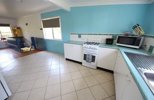 Hat Head House | Large holiday home opposite the creek with plenty of room for all the family