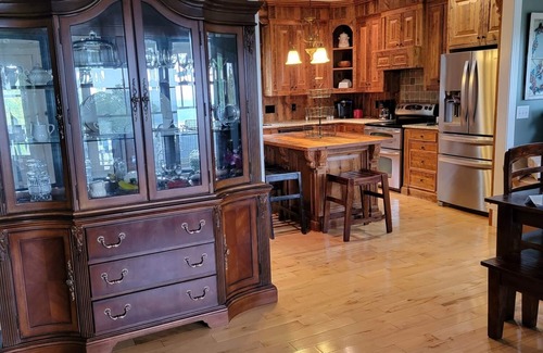 Ten Mile House | Large lake property in Ten Mile, amazing sunset views, two boat slips, fire pit