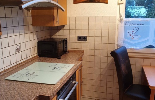 West Condo | Large maisonette near Düsseldorf Central yet quiet with garden and underground parking space
