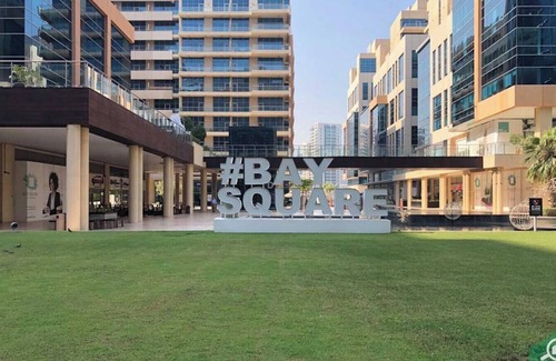 Madinat Zayed Apartment | Large Modern 1-Bedroom in Bay Square 9