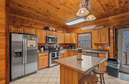 Cosby Cabin | Large Private backyard, Paired driving games, Indoor Pool, Theater room