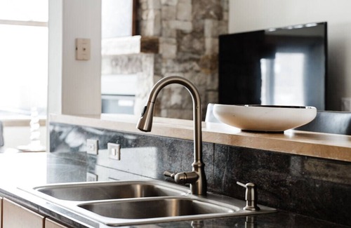 Peak 8 House | Large ski-in/ski-out home with mtn views, hot tub, firepit