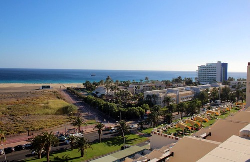 Morro Jable Apartment | Large sun terrace with a view over the beach of Jandia