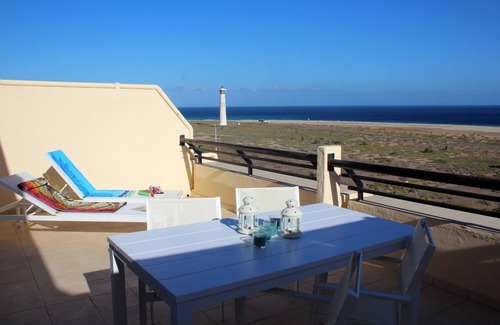 Morro Jable Apartment | Large sun terrace with a view over the beach of Jandia