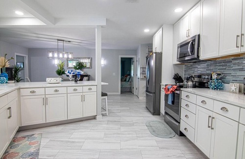 Lochmoor Waterway Estates House | "Latitude Adjustment" with Heated Pool and Boat Dock