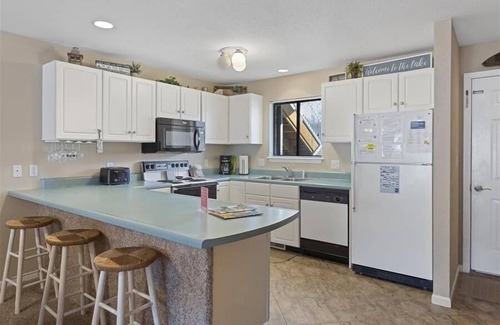 Osage Beach Condo | Lazy V-01 Lake Front Five Bedroom, Four Bath Condo with Room to Spread Out!