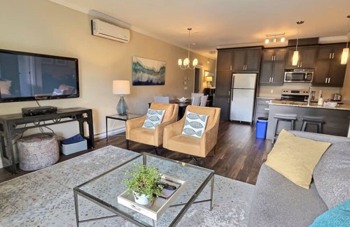 Bromont Condo | LE CHAMPLAIN CONDO 104, in BROMONT, View on the Pool and Mountain, CITQ#248205