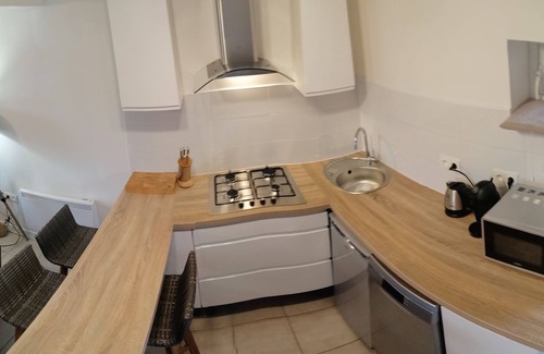 Saint-Georges-le-Gaultier Apartment | LE JARRIER APARTMENT - ALPES MANCELLES. PRIVATE GARDEN & BBQ PARKING & FREE WIFI