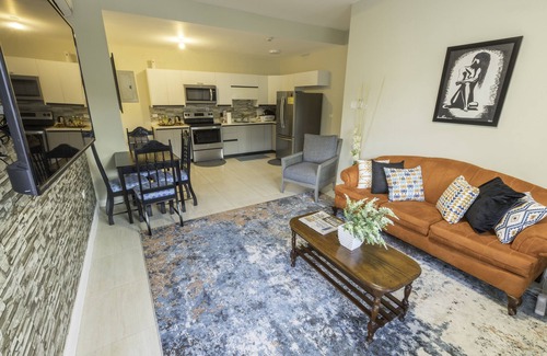New Kingston Condo | "Le Luxe" Penthouse 2 BR condo w/AC, WiFi, complimentary Netflix & 24/7 sec